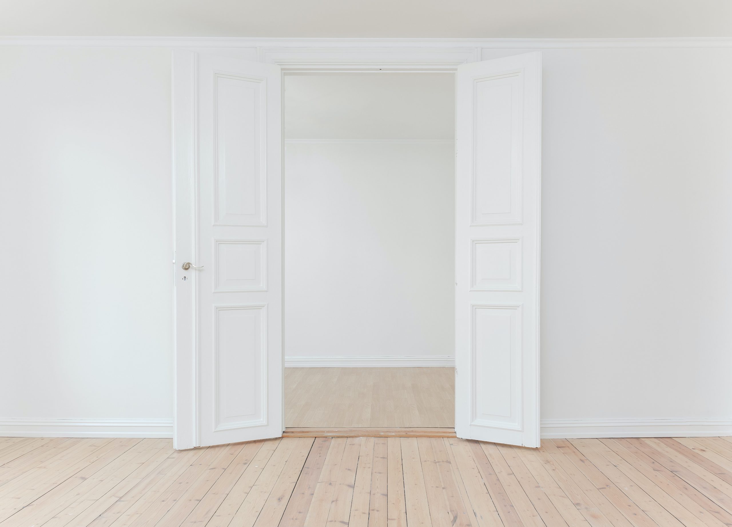 a-door-in-white-room